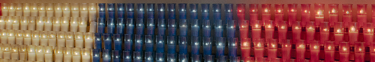 Why do we light votive candles?